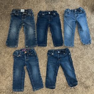Five pair of girl’s 12 to 18 months pants.